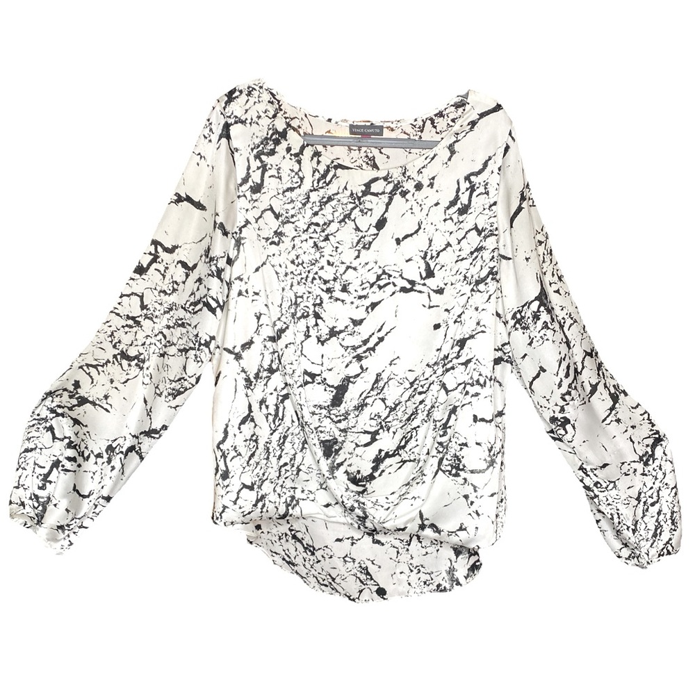 Lightweight & “flowy” long sleeve, Gathers in front for a faux tuck look.